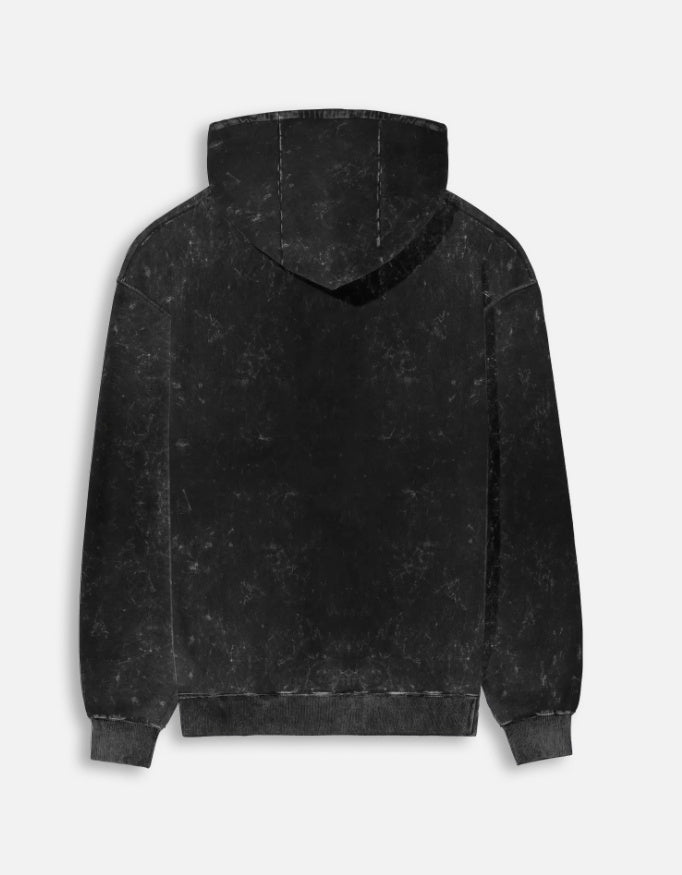 Back view of a black acid wash hoodie with hood and ribbed cuffs on white background