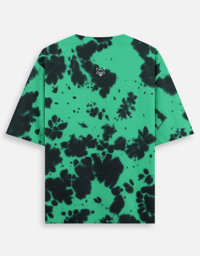 Green and black tie-dye t-shirt with short sleeves and small fox graphic on back