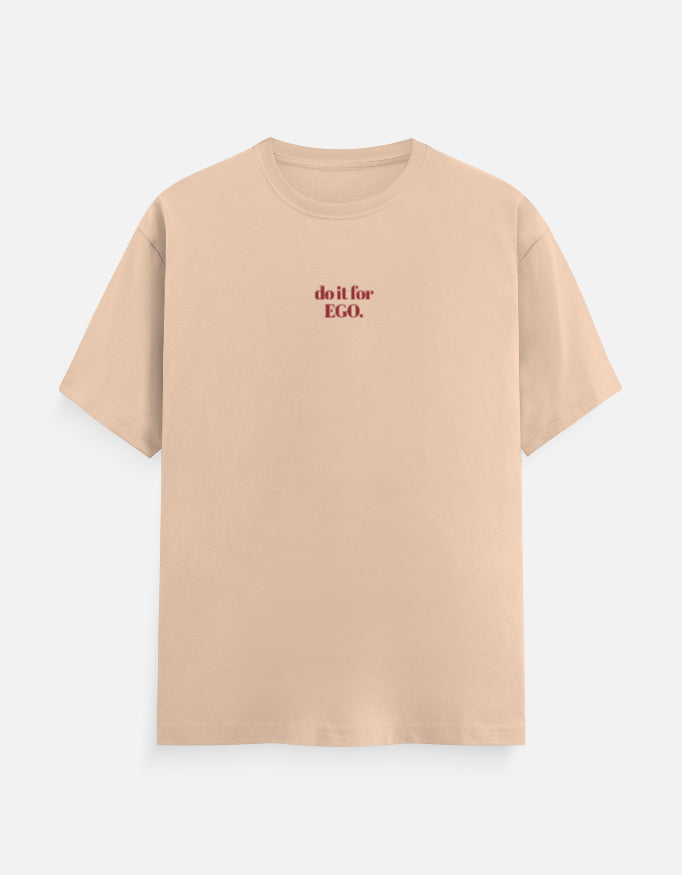 Beige t-shirt with text on a white background
