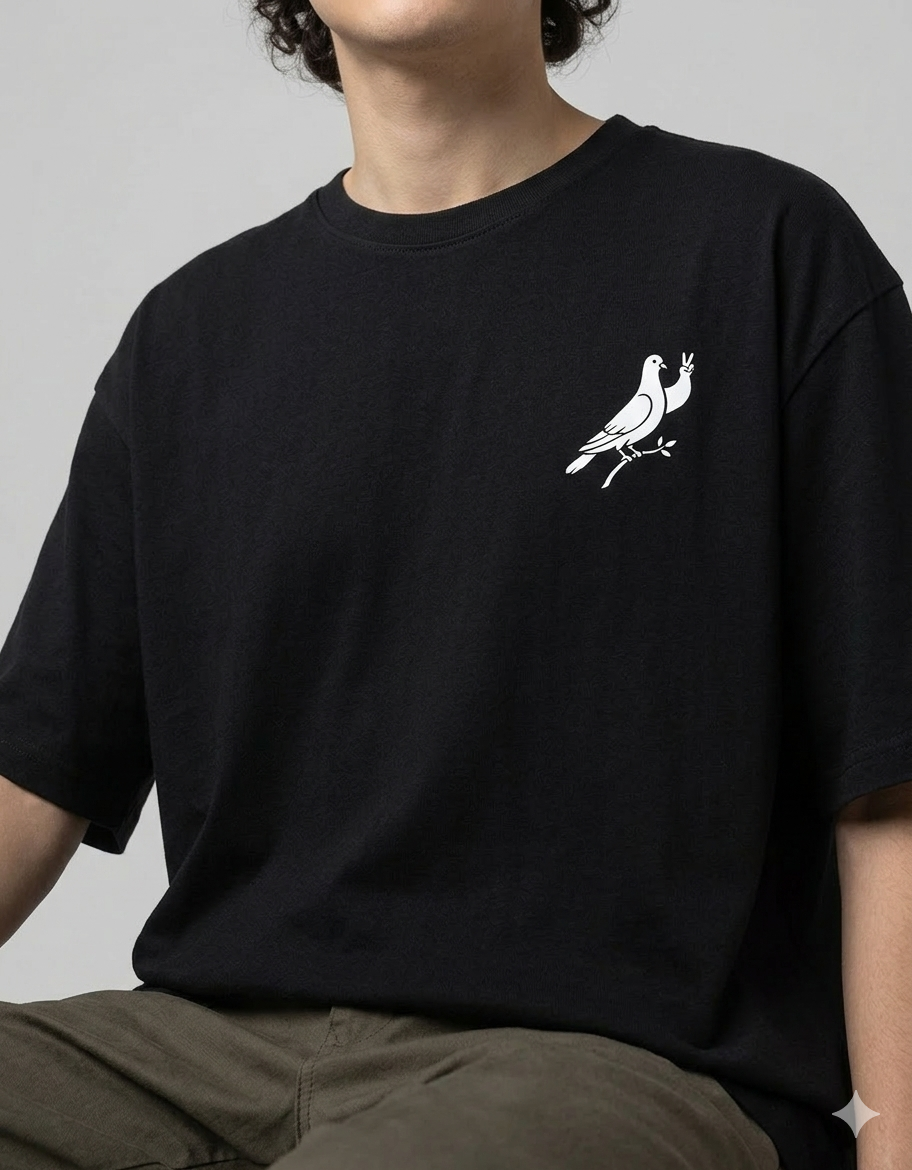 Black t-shirt with white dove and peace sign graphic on chest, casual streetwear style