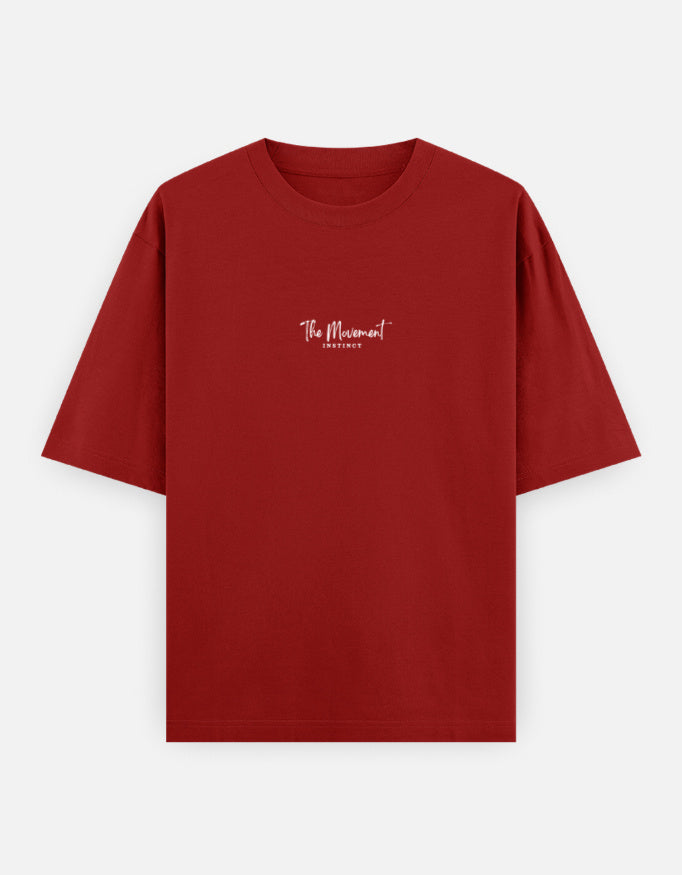 Red unisex t-shirt with 'The Movement Instinct' white text on chest, short sleeves