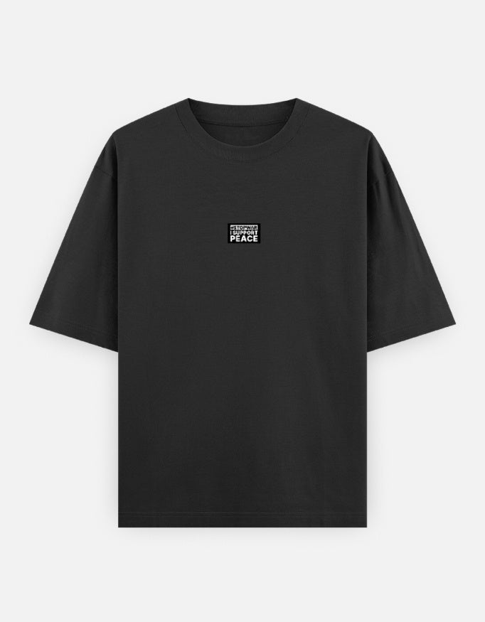 Black unisex t-shirt with 'I support peace' text graphic on chest, displayed on white background.