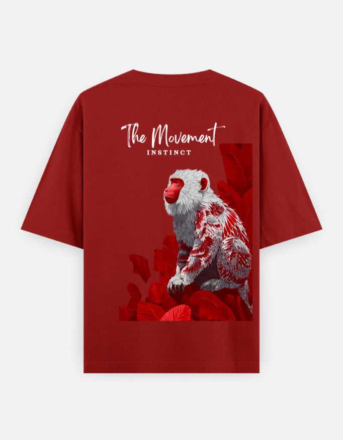 Red t-shirt featuring a graphic monkey and 'The Movement Instinct' text on the back.